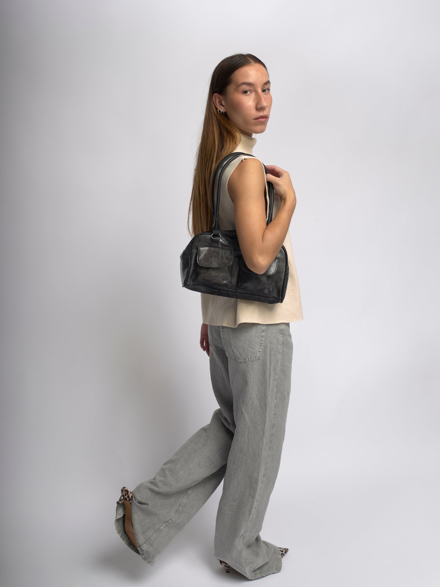 Städtische elegante, abgenutzte Leder-Schultertasche
