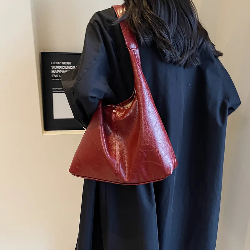Luxuriöse Kettenriemen-Handtasche – Stilvoll und Vielseitig