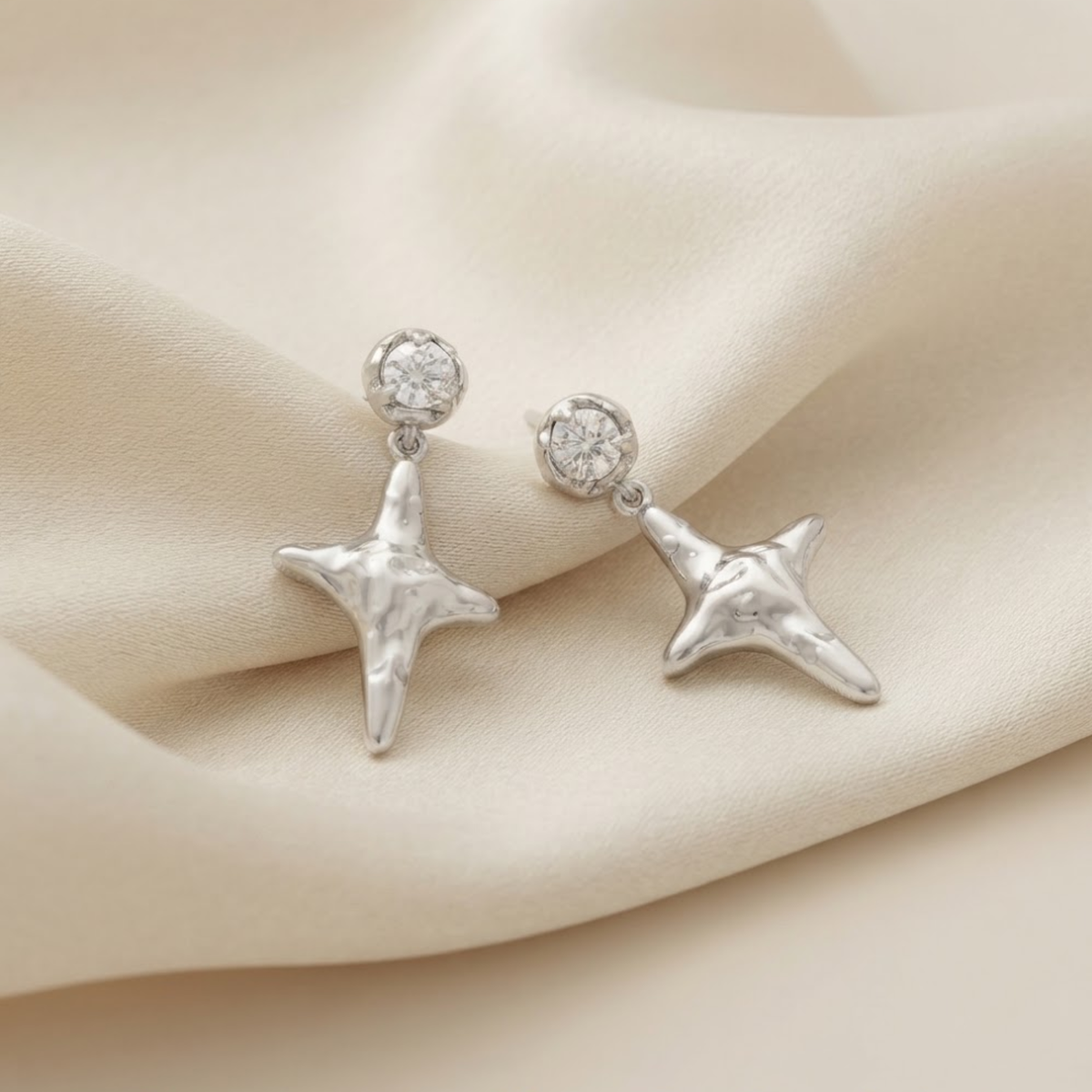 Celebyia Four-Point Star Earrings