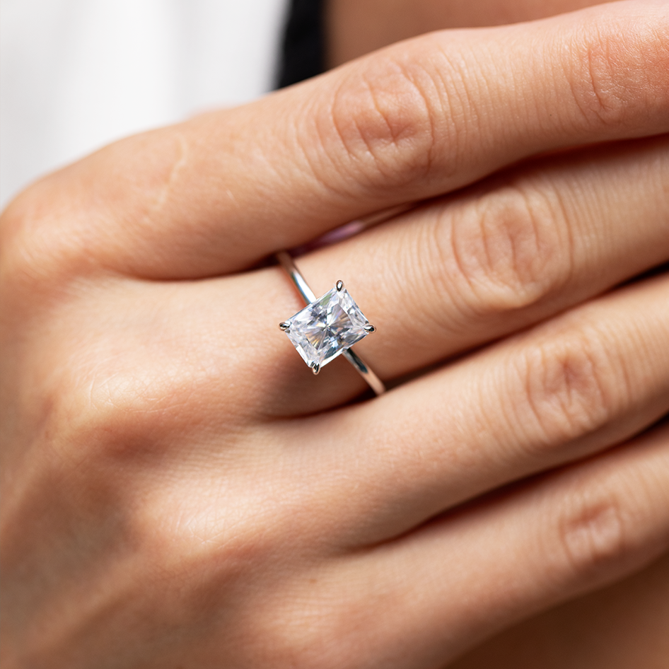 Lustrous Glow Moissanite Solitaire Sterling Silver Ring