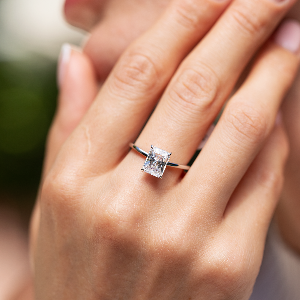 Lustrous Glow Moissanite Solitaire Sterling Silver Ring