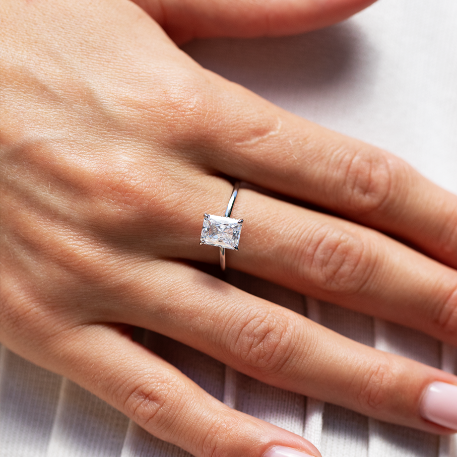 Lustrous Glow Moissanite Solitaire Sterling Silver Ring