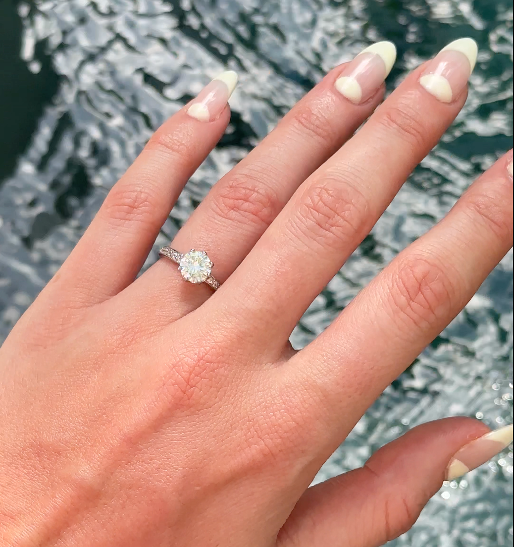 Exquisite Precious Metal Ring with Brilliant Center Stone